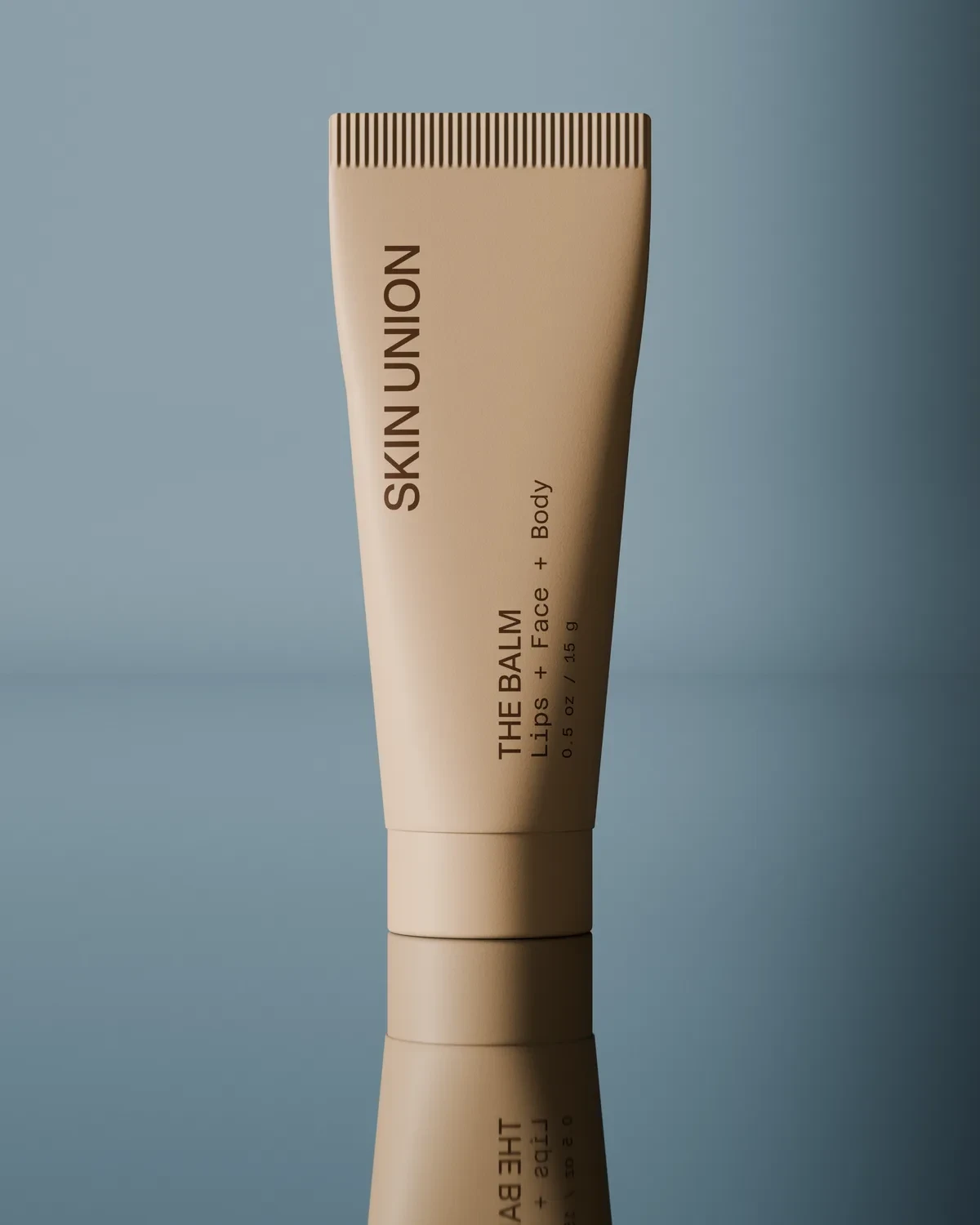 The Balm — a small pale tube for lips, face and body