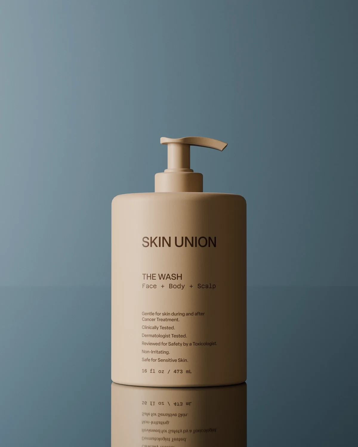 The Wash — a pale ceramic pump bottle, 500 mL